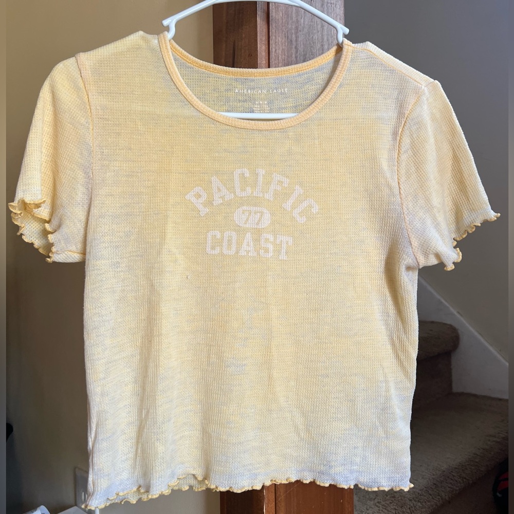 American Eagle Yellow T-shirt with ruffles. Size medium.💛